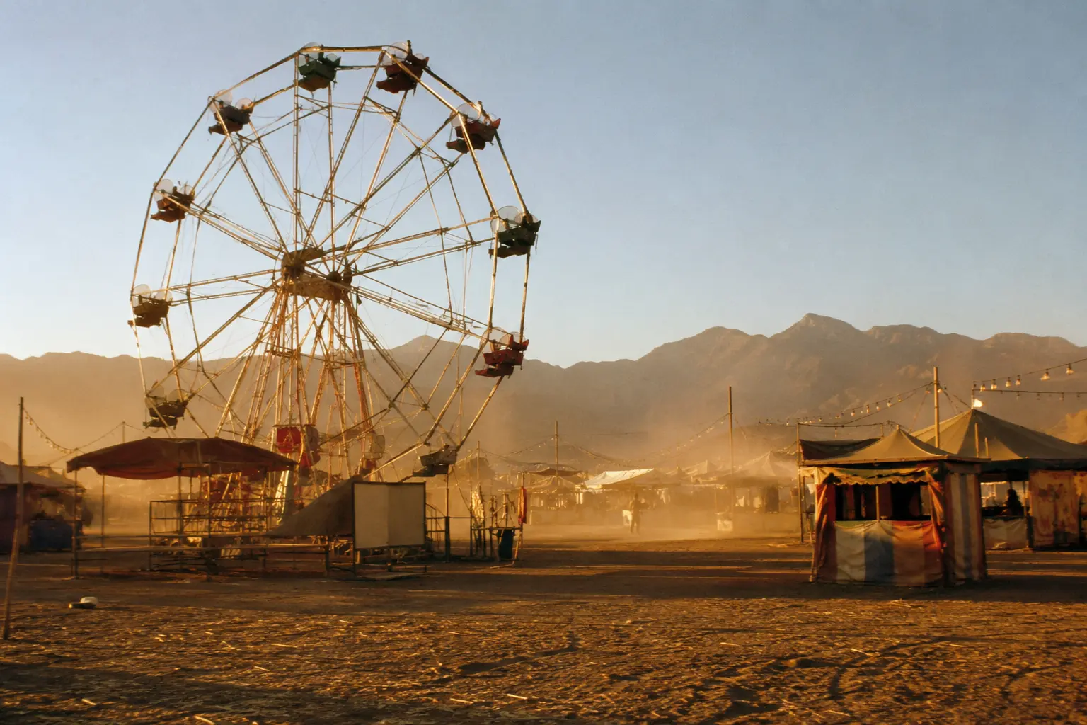 A ferris wheel and fairground in the Arizona desert